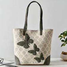 cute leather and cotton printed rug handbag